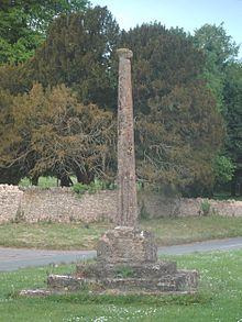 At the centre of Woodeaton Village, by the village green, are the base and shaft of a 13th-century stone cross. The cross is both a scheduled monument and a Grade I listed building.